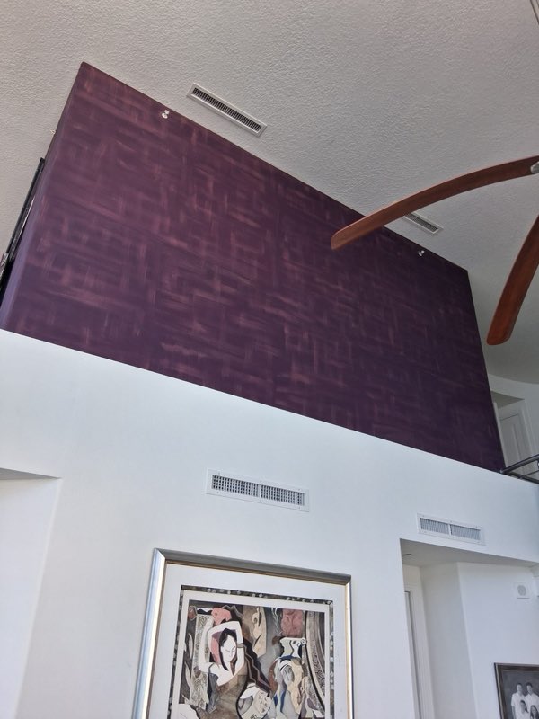 Two-story accent wall before repainting
